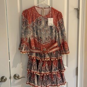 Zimmerman dress brand new and never worn. I’m a size 2 normally. Runs small